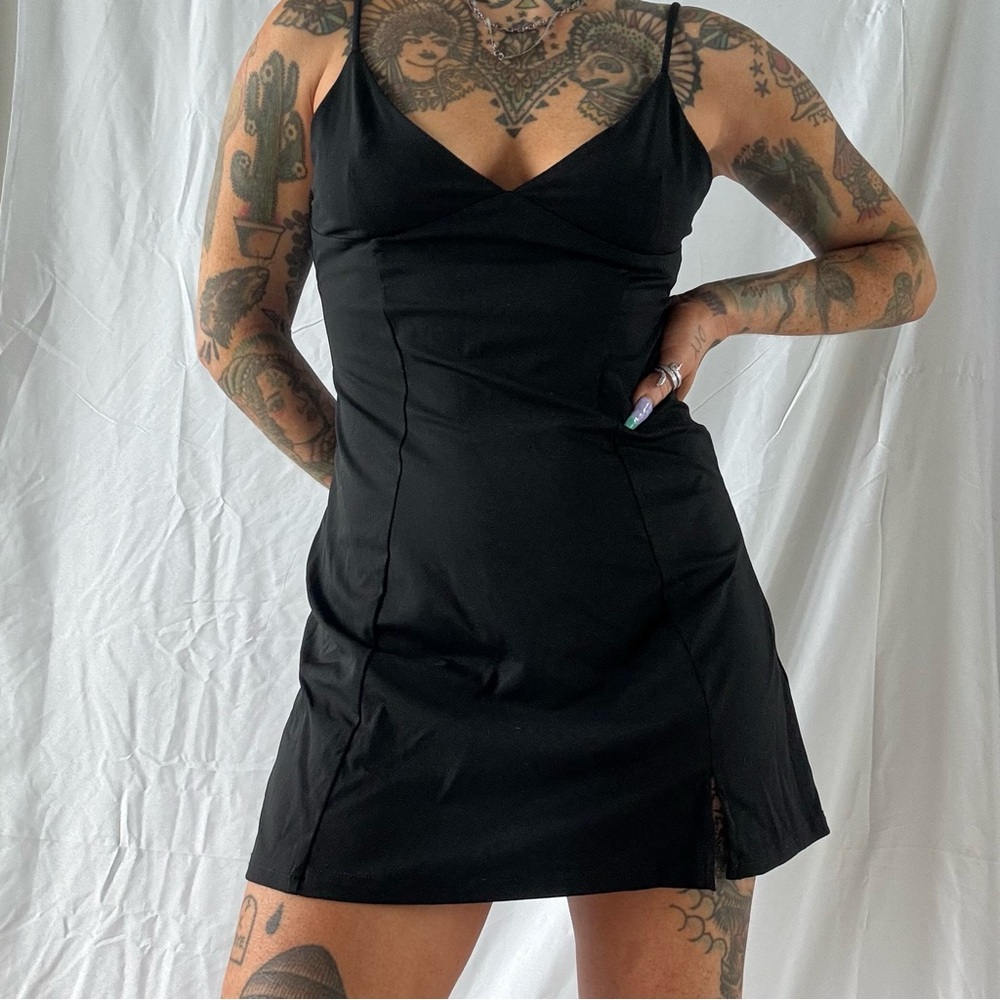 Size small stretchy black athletic dress, never worn
